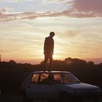 夕阳男生往右侧面头像图片_WWW.WHOISQQ.COM